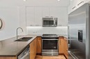 313-510 Edmonton Trail Ne, Calgary, AB  - Indoor Photo Showing Kitchen With Double Sink With Upgraded Kitchen 