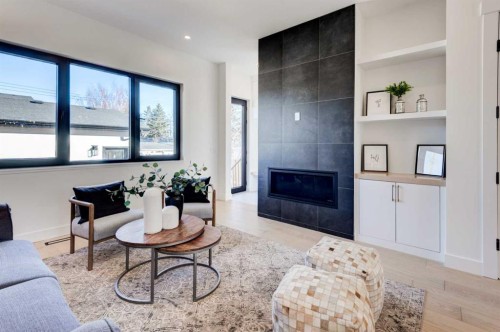 3716 44 Street Sw, Calgary, AB - Indoor Photo Showing Living Room With Fireplace