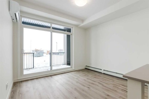 4111-200 Seton Circle Se, Calgary, AB - Indoor Photo Showing Other Room