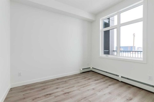 4111-200 Seton Circle Se, Calgary, AB - Indoor Photo Showing Other Room
