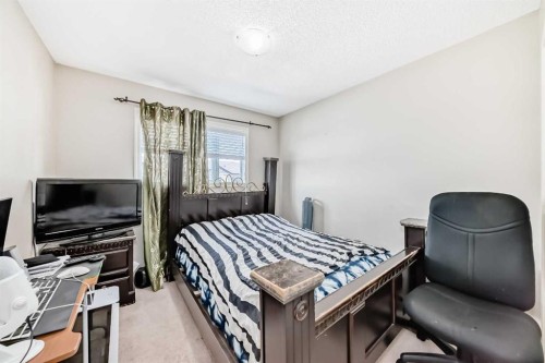 147 Saddlebrook Point Ne, Calgary, AB - Indoor Photo Showing Bedroom