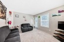 147 Saddlebrook Point Ne, Calgary, AB  - Indoor Photo Showing Living Room 