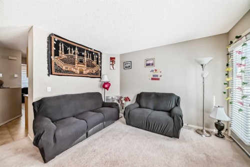 147 Saddlebrook Point Ne, Calgary, AB - Indoor Photo Showing Living Room