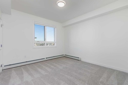 1308-520 Reynolds Avenue Sw, Airdrie, AB - Indoor Photo Showing Other Room