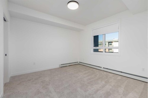 1308-520 Reynolds Avenue Sw, Airdrie, AB - Indoor Photo Showing Other Room