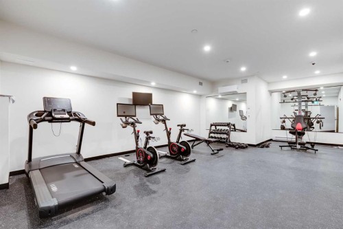 1308-520 Reynolds Avenue Sw, Airdrie, AB - Indoor Photo Showing Gym Room