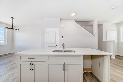 115 Montane Link Se, High River, AB - Indoor Photo Showing Kitchen With Double Sink