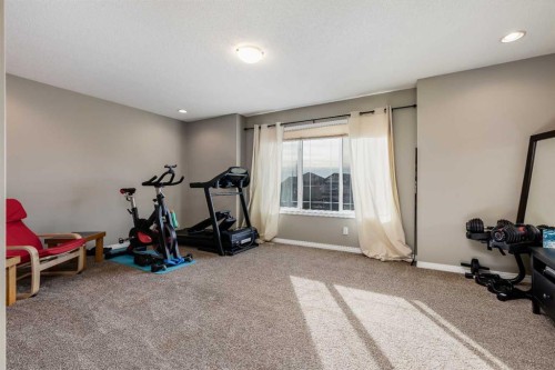 407 Morningside Crescent Sw, Airdrie, AB - Indoor Photo Showing Gym Room