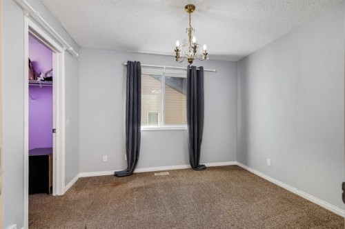 407 Morningside Crescent Sw, Airdrie, AB - Indoor Photo Showing Other Room