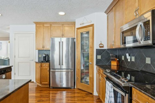 160 Sunset Close, Cochrane, AB - Indoor Photo Showing Kitchen With Stainless Steel Kitchen