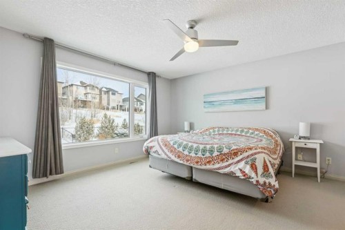 160 Sunset Close, Cochrane, AB - Indoor Photo Showing Bedroom