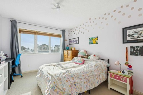 160 Sunset Close, Cochrane, AB - Indoor Photo Showing Bedroom
