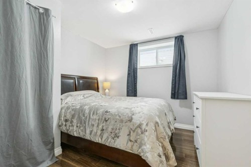 160 Sunset Close, Cochrane, AB - Indoor Photo Showing Bedroom