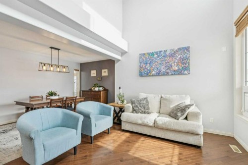 160 Sunset Close, Cochrane, AB - Indoor Photo Showing Living Room