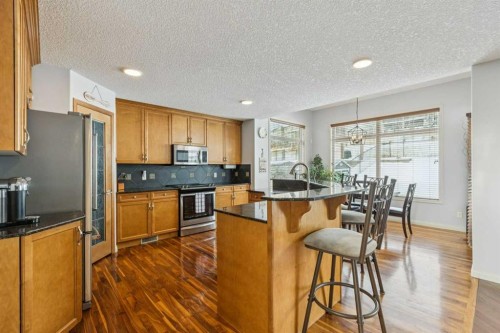 160 Sunset Close, Cochrane, AB - Indoor Photo Showing Kitchen With Stainless Steel Kitchen