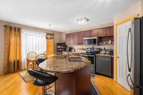 7945 Springbank Boulevard Sw, Calgary, AB - Indoor Photo Showing Kitchen With Double Sink