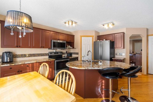 7945 Springbank Boulevard Sw, Calgary, AB - Indoor Photo Showing Kitchen With Double Sink