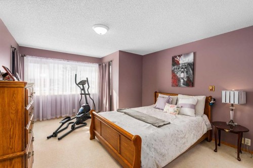 7945 Springbank Boulevard Sw, Calgary, AB - Indoor Photo Showing Bedroom