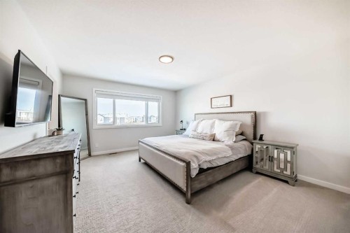 29 Cranbrook Mount Se, Calgary, AB - Indoor Photo Showing Bedroom