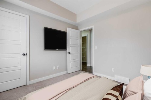 1511-2461 Baysprings Link Sw, Airdrie, AB - Indoor Photo Showing Bedroom