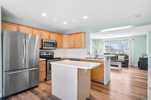 327 Copperstone Grove Se, Calgary, AB - Indoor Photo Showing Kitchen With Stainless Steel Kitchen With Double Sink