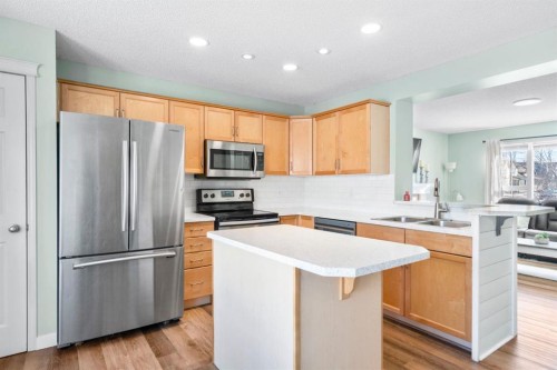 327 Copperstone Grove Se, Calgary, AB - Indoor Photo Showing Kitchen With Stainless Steel Kitchen With Double Sink