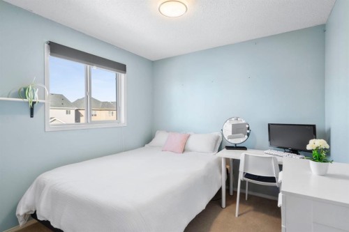 327 Copperstone Grove Se, Calgary, AB - Indoor Photo Showing Bedroom