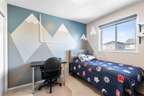 327 Copperstone Grove Se, Calgary, AB - Indoor Photo Showing Bedroom