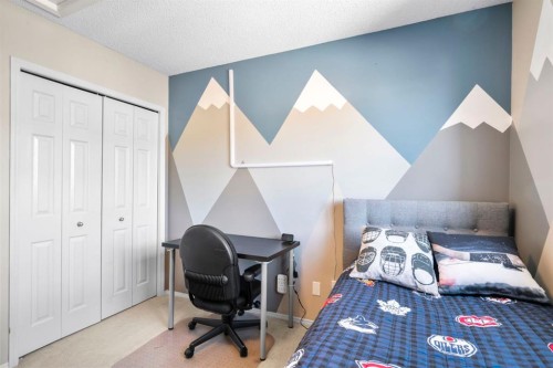 327 Copperstone Grove Se, Calgary, AB - Indoor Photo Showing Bedroom
