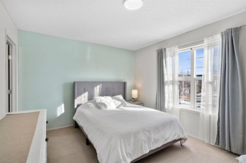 327 Copperstone Grove Se, Calgary, AB - Indoor Photo Showing Bedroom