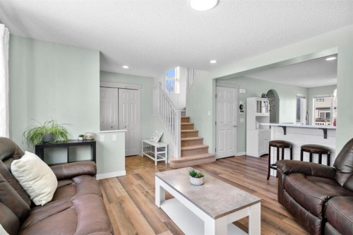 327 Copperstone Grove Se, Calgary, AB - Indoor Photo Showing Living Room
