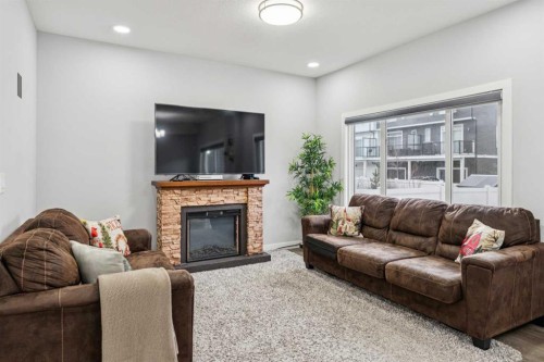 123 Walcrest Way Se, Calgary, AB - Indoor Photo Showing Living Room With Fireplace