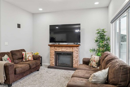 123 Walcrest Way Se, Calgary, AB - Indoor Photo Showing Living Room With Fireplace