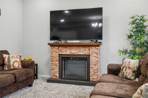 123 Walcrest Way Se, Calgary, AB - Indoor Photo Showing Living Room With Fireplace
