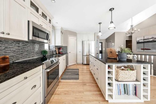 10 Bow Point, Cochrane, AB - Indoor Photo Showing Kitchen With Stainless Steel Kitchen With Upgraded Kitchen