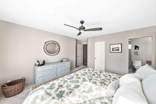 10 Bow Point, Cochrane, AB - Indoor Photo Showing Bedroom