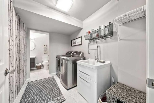 10 Bow Point, Cochrane, AB - Indoor Photo Showing Laundry Room