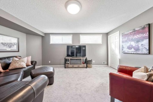 10 Bow Point, Cochrane, AB - Indoor Photo Showing Living Room