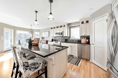 10 Bow Point, Cochrane, AB - Indoor Photo Showing Kitchen With Stainless Steel Kitchen With Upgraded Kitchen