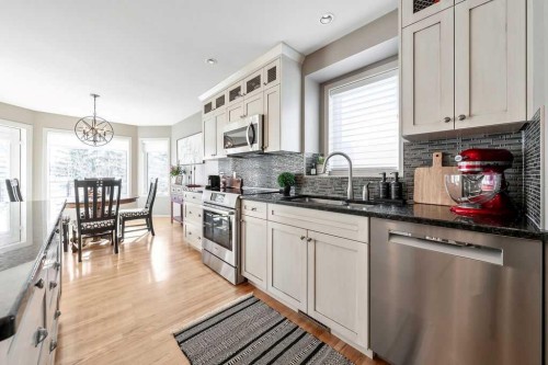 10 Bow Point, Cochrane, AB - Indoor Photo Showing Kitchen With Stainless Steel Kitchen With Upgraded Kitchen