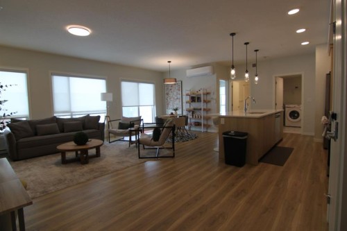 1207-220 Seton Grove Se, Calgary, AB - Indoor Photo Showing Living Room