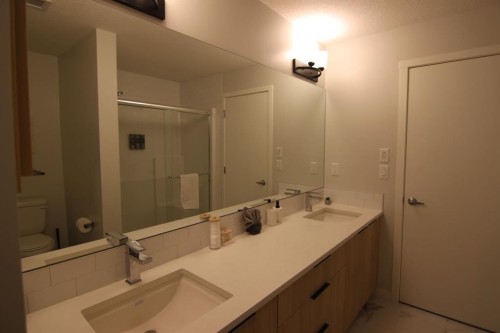 1207-220 Seton Grove Se, Calgary, AB - Indoor Photo Showing Bathroom