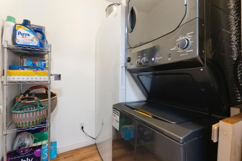 301-128 Centre Avenue, Cochrane, AB - Indoor Photo Showing Laundry Room
