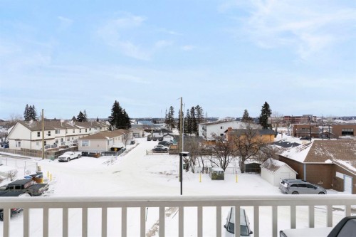 301-128 Centre Avenue, Cochrane, AB - Outdoor With Balcony