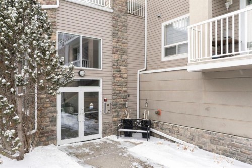 301-128 Centre Avenue, Cochrane, AB - Outdoor With Exterior