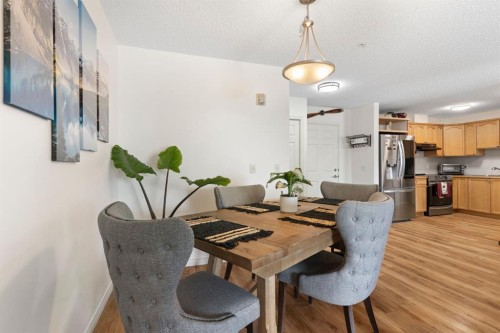 301-128 Centre Avenue, Cochrane, AB - Indoor Photo Showing Dining Room
