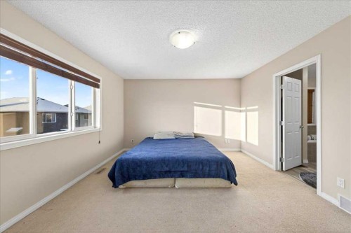 34 Saddlecrest Crescent Ne, Calgary, AB - Indoor Photo Showing Bedroom