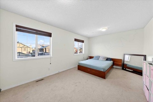 34 Saddlecrest Crescent Ne, Calgary, AB - Indoor Photo Showing Bedroom