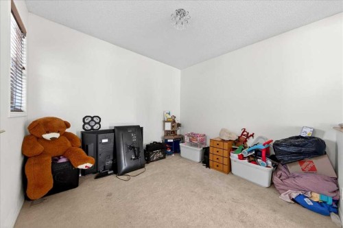 34 Saddlecrest Crescent Ne, Calgary, AB - Indoor Photo Showing Other Room