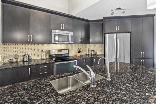 162 Auburn Crest Way Se, Calgary, AB - Indoor Photo Showing Kitchen With Double Sink With Upgraded Kitchen